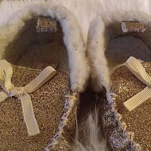 Glod and white moccasins